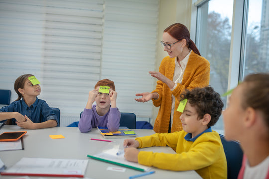teacher working with a small group of kids