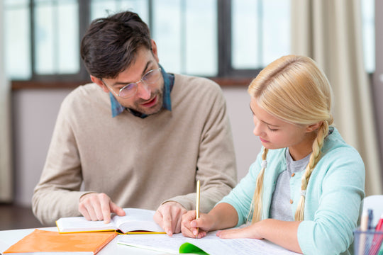 girl at home writing new information